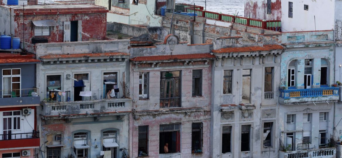 PEOPLE STAND ON BALCONIES BLACKOUT HAVANA