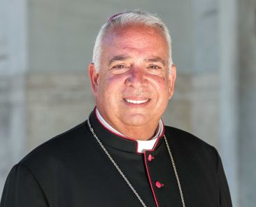 Archbishop Nelson J. Pérez of Philadelphia poses for a photo outside the Basilica of St. Paul Outside the Walls in Rome July 30, 2025. Archbishop Pérez will deliver remarks at the National Constitution Center’s July 3 Liberty Medal Award ceremony in Philadelphia, along with live-streamed remarks from Pope Leo XIV, this year’s award recipient.(CNS photo/Lola Gomez)