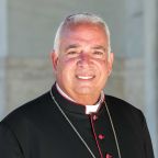 Archbishop Nelson J. Pérez of Philadelphia poses for a photo outside the Basilica of St. Paul Outside the Walls in Rome July 30, 2025. Archbishop Pérez will deliver remarks at the National Constitution Center’s July 3 Liberty Medal Award ceremony in Philadelphia, along with live-streamed remarks from Pope Leo XIV, this year’s award recipient.(CNS photo/Lola Gomez)
