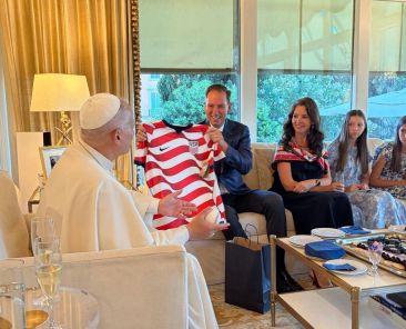 Pope Leo XIV spends the evening of July 4, 2026, with U.S. ambassador Brian Burch and his family, where they discussed peace and freedom, and the Burch family presented the pope with a U.S.A. World Cup jersey, a baseball and an apple pie. (OSV News photo/courtesy U.S. Embassy to the Holy See)