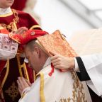 U.S. Father Michael Goldade bows with the Gospels on his shoulders as Bishop Alfonso de Galarreta lays his hands on his head during an episcopal ordination without papal approval for the Society of St. Pius X in Écône, Switzerland, July 1, 2026. The schismatic act of conferring episcopal consecration upon four priests without pontifical mandate and against the will of the pope incurred automatic excommunication for the prelates directly involved. (CNS photo/courtesy Society of St. Pius X)