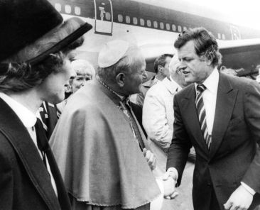U.S. Sen. Ted Kennedy greets St. John Paul II, as first lady Rosalyn Carter, wife of President Jimmy Carter, looks on, during his arrival in Boston in 1979. During his papacy, St. John Paul made seven visits to the United States and in his remarks often drew on the nation's foundational documents -- the Declaration of Independence, the Constitution and the Bill of Rights. (OSV News file photo)