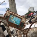An image of Christ lies among the rubble as people search for the bodies of their loved ones in La Guaira, Venezuela, July 18, 2026, following the aftermath of the June 24 earthquakes. Two catastrophic earthquakes hit Venezuela in quick succession June 24, leaving more than 5,000 dead with thousands still missing. (OSV News photo/Leonardo Fernandez Viloria, Reuters)