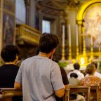 Young Catholics pray inside the Church of San Marcello al Corso in Rome during the street evangelization event July 14, 2026, hosted by young people taking part in Regnum Christi's International Formators Course. (OSV News photo/Regnum Christi Communications Office)