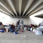 Homeless men are seen in a file photo outside their tents under a bridge in Austin, Texas. Urban planning must address homelessness to promote human dignity, the Holy See's Permanent Observer Mission to the United Nations said in a message released July 28, 2026. (OSV News photo/CNS file, Bob Roller)