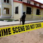 A police crime scene tape is seen in front of St. Francis Catholic Church where gunmen attacked worshippers during Mass in Owo, Ondo, Nigeria, June 6, 2022. Police in northern Nigeria were investigating the murder of a Father Samuel Opeyemi Oyetoro, who was killed in an apparent roadside ambush, the Diocese of Lokoja announced in a Facebook post July 30, 2026. (OSV News photo/Temilade Adelaja, Reuters)