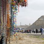 Rosaries are seen displayed at a souvenir shop in a file photo as Orthodox Christian pilgrims make their way to Mass at a baptism site on the Jordan River. Jordanian Prime Minister Jafar Hassan signed agreements Aug. 12, 2026, to begin work on the development of the lands adjacent to the Baptism Site to commemorate the second millennium of Christ's baptism in 2030 at the direction of Jordan's King Abdullah II. (OSV News photo/Muhammad Hamed, Reuters)