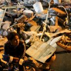 A person looks on amid rubble as rescue efforts continue at the site of a damaged building in Cali, Colombia, Aug. 11, 2026, following a 7.4-magnitude earthquake. The Colombian Bishops' Conference confirmed that Pope Leo XIV, through the papal almoner's office, sent an initial donation of 100,000 euros (more than $115,000) for relief efforts in the country. (OSV News photo/Raquel Cunha, Reuters)