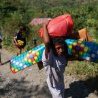 Villagers living near the sea move to higher ground following an aftershock from the earthquake in Ende, East Nusa Tenggara, Indonesia, Aug. 17, 2026. A powerful 7.7-magnitude earthquake struck the country's eastern coast early Aug. 15, local time, killing over 50 people and leaving thousands displaced in the aftermath. (OSV News photo/Edgar Su, Reuters)