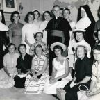 Archbishop Fulton J. Sheen is seen in an undated photo posing with women who worked at the Society for the Propagation of the Faith in New York City. (OSV News photo/Pontifical Mission Societies USA Archives)