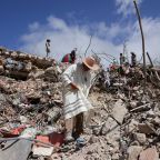 A priest walks through the debris of a collapsed building in La Guaira, Venezuela, July 17, 2026, in the aftermath of earthquakes on June 24. Two catastrophic earthquakes hit Venezuela in quick succession, leaving more than 6,000 dead. (OSV News photo/Gaby Oraa, Reuters)