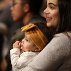 In this file photo, a woman holds her daughter during the opening Mass of the National Prayer Vigil for Life Jan. 19, 2023, at the Basilica of the National Shrine of the Immaculate Conception in Washington. (OSV News photo/Bob Roller)
