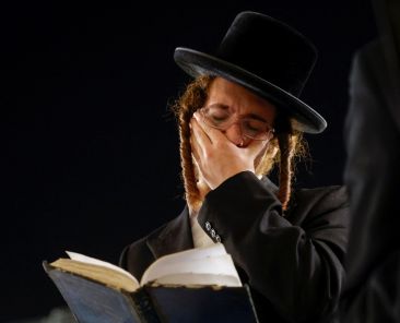 A Jewish worshipper takes part in Slichot, a prayer in which Jews offer repentance and ask God to forgive their sins, ahead of Yom Kippur, the Jewish day of atonement and the holiest day in the Jewish calendar, at the Western Wall in Jerusalem's Old City, Sept. 14, 2023. Bishop Joseph C. Bambera of Scranton, Pa., chairman of the US. bishops' Committee on Ecumenical and Interreligious Affairs, has released a video message to the Jewish community as it celebrates Yom Kippur Sept. 20-21 amid rising antisemitism. (OSV News photo/Amir Cohen, Reuters)