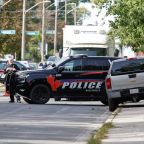 Police investigators talk at the scene of a shooting at Sons of Jacob Synagogue in Belleville, Ontario, Sept. 21, 2026, where a police officer was shot outside a Yom Kippur gathering the day before. A 29-year-old man armed with a shotgun opened fire on the officer outside the synagogue and triggered a shootout involving as many as 30 shots, province police officials said Sept. 21. (OSV News photo/Patrick Doyle, Reuters)