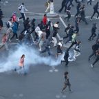 Protesters run through tear gas amid clashes with French police at Place de la Nation in Paris Oct. 6, 2026, during a demonstration by high school and university students. Just days after Pope Leo XIV's Sept. 25-28 apostolic visit to France, riots that began in the Paris region on a small scale Sept. 17 spread nationwide. (OSV News photo/Yves Herman, Reuters)