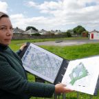 Senior forensic consultant Niamh McCullagh holds a map July 7, 2025, showing the planned excavation of the graveyard in Tuam, Ireland, where the bodies of 796 babies were uncovered at the site of a former mother-and-baby home run on behalf of the Irish government by the Catholic Sisters of Bon Secours. (OSV News/Clodagh Kilcoyne, Reuters)