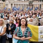 Faithful pray in St. Peter's Square as Pope Leo XIV leads the Angelus prayer from a window of the Apostolic Palace, following his discharge from hospital after surgery for lung cancer, at the Vatican, Oct. 18, 2026. (OSV News photo/Matteo Minnella, Reuters)