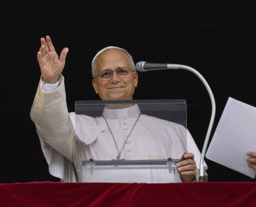 Pope Leo XIV gestures as he leads the Angelus in St. Peter's Square at the Vatican Oct. 18, 2026, after being released from the hospital the previous day. Lead surgeon Dr. Stefano Margaritora said the pope's recovery is progressing normally and that there is no medical reason to cancel his planned Nov. 6-17 trip to South America. (OSV News photo/Matteo Pernaselci, Vatican Media)