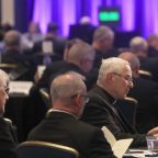 Bishops pray during a Nov. 12, 2025, session of the fall general assembly of the U.S. Conference of Catholic Bishops in Baltimore. (OSV News photo/Bob Roller)