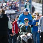 Tyler Jedwabny pushes his son Brett's wheelchair during the 1.7-mile children's Walk to Mary May 2, 2026, at the National Shrine of Our Lady of Champion in Champion, Wis. (OSV News photo/Sam Lucero)