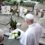 Pope Leo XIV arrives to lay a bouquet of flowers at a tomb in Verano Cemetery in Rome Nov. 2, 2025, ahead of celebrating Mass for the feast of All Souls. Pope Leo will celebrate Mass for the 2026 feast at the same cemetery, Rome's largest, and this year's Nov. 2 Mass will be the first of 12 public Masses the pope will celebrate in November. (CNS photo/Lola Gomez)