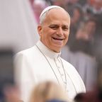 Pope Leo XIV smiles from the popemobile while riding around St. Peter’s Square at the Vatican before his weekly general audience Oct. 28, 2026. (CNS photo/Lola Gomez)